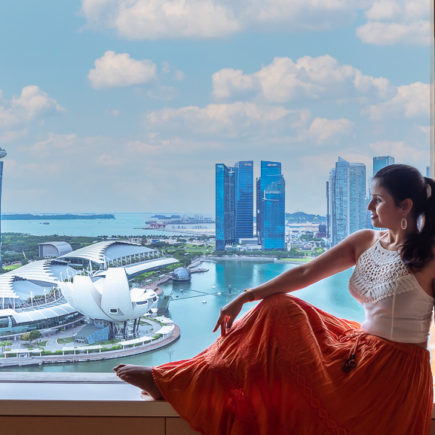 Happy girl at Best Hotel in Singapore Ritz Carlton Millenia
