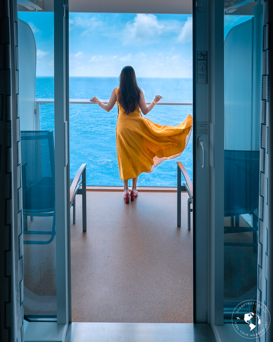 A girl watching Stunning ocean views from balcony on Royal Caribbean